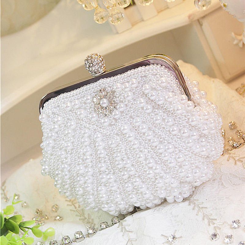 Luxury Scalloped Pearl Clutch  - огляд і ціна Luxury Bags Direct
