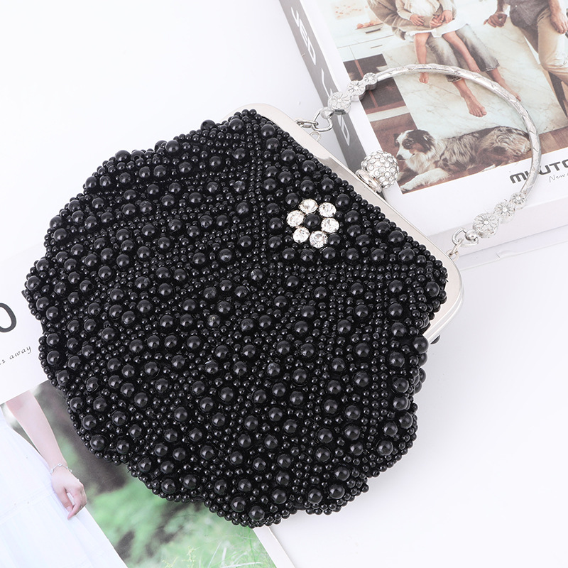 Luxury Scalloped Pearl Clutch  - огляд і ціна Luxury Bags Direct